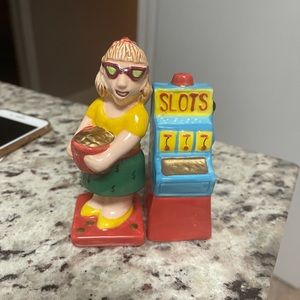 Slot machine & lady with winnings salt & pepper shakers